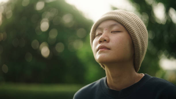 istock Teenager relaxing at park. 2154437527