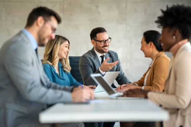 istock Team leader discussing and brainstorming new approaches and ideas with colleagues. 2154437788