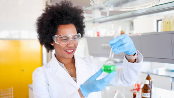 istock Female scientist examining some chemicals 2154438509