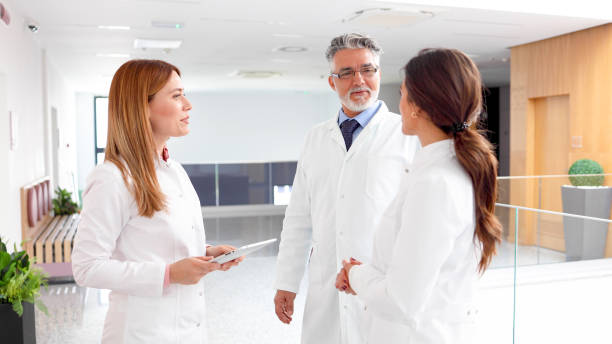 istock Team of scientists cooperating outside the lab 2154438680