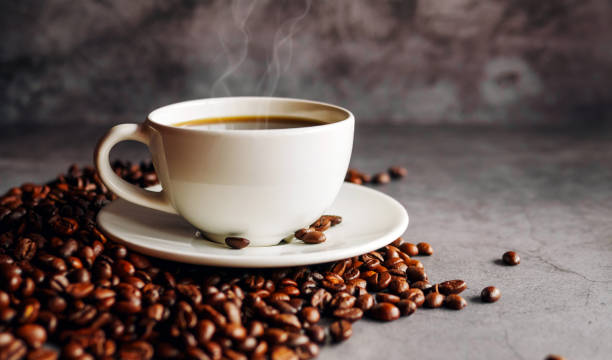 istock Coffee cup and coffee beans on  gray background, Black coffee cup aromatic 2154440113