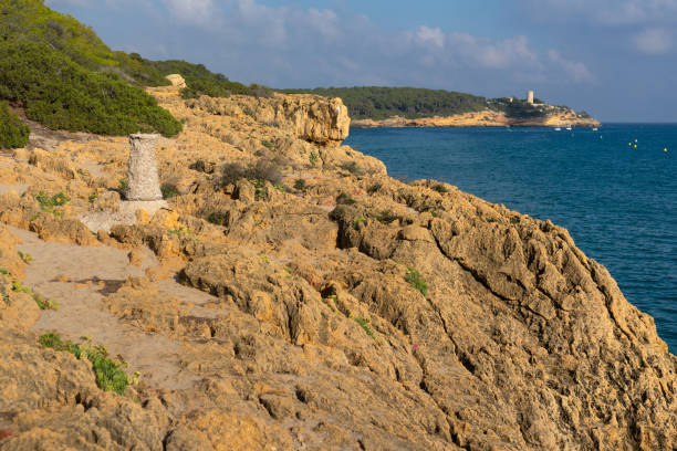 istock La Marquesa pine forest with the Mora tower and the cliffs in the background in a sunny day. Tarragona, Catalonia, Spain. 2154441707