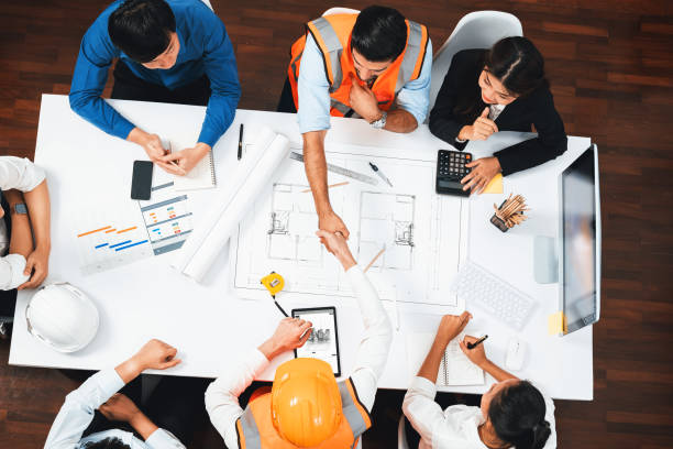 istock Diverse group of civil engineer and client shakes hand after. Prudent 2154441765