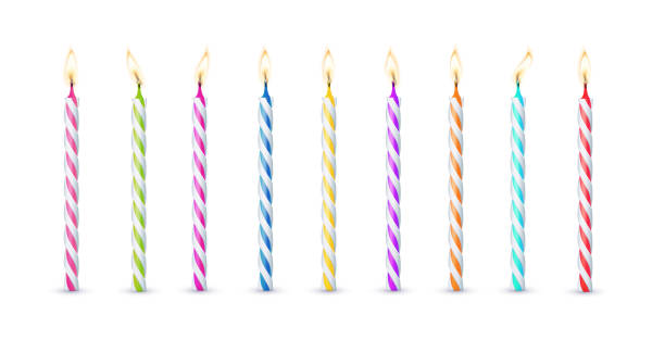 istock 3d realistic colorful candles for birthday cake. Holiday candles with burning flames candlelight on wicks, celebration objects. Vector 2154445432