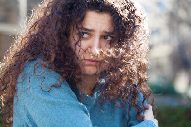 istock Young woman suffering from mental health issues 2154449916