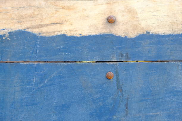 stacked blue wooden planks, nailed. This image is suitable for use as a background or wallpaper. old wooden door.