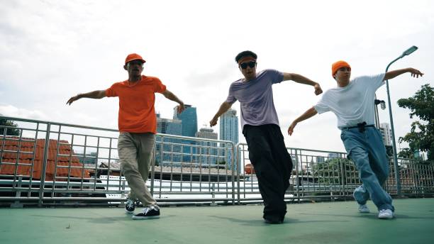istock Group of skilled break dancer perform hip hop foot step together. Sprightly. 2154454021