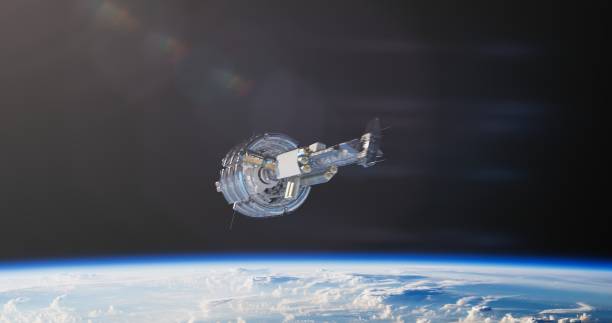 istock Against Earth's background, the space station completes its orbit 2154454924