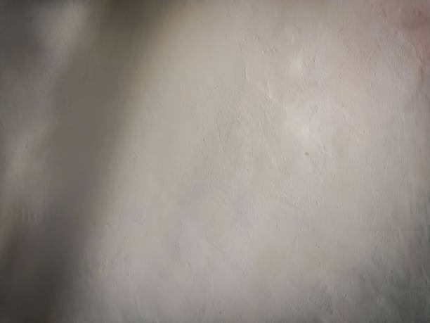 istock abstract background of white concrete texture with shadow 2154455274
