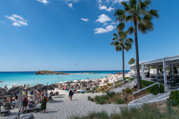Ayia Napa, Nissi Beach, Cyprus; May 7th, 2024: Crowd of people occupying the landmark Nissi Beach on Cyprus