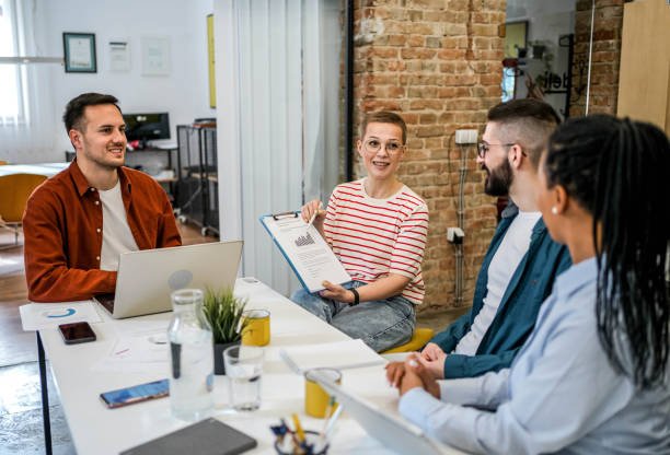istock Casual business people working together 2154460420