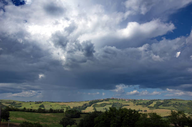 Montefeltro hilly landscape against scenic sky with clouds
