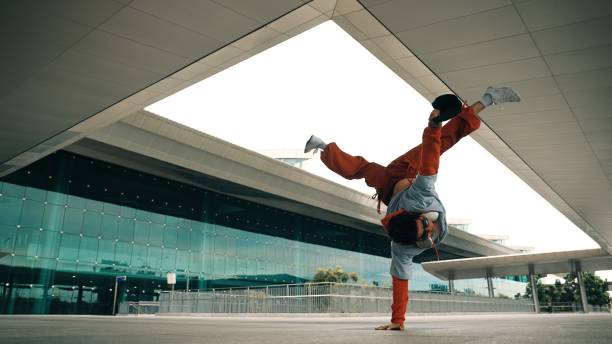istock Attractive hipster perform energetic dance while hiphop listen music. Sprightly. 2154465365