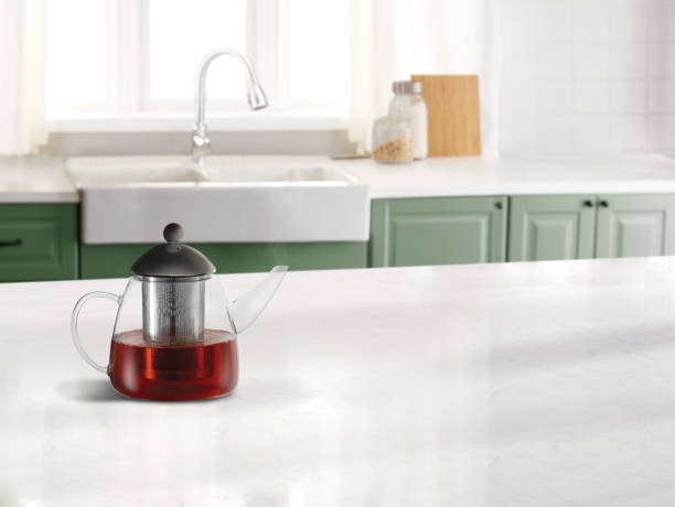 istock Tea kettle with a built in filter in a kitchen with a marble counter top 2154467079