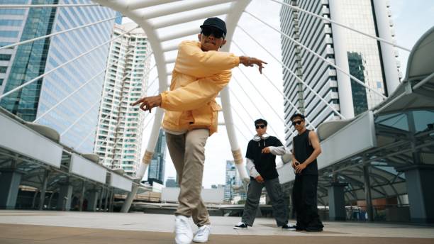istock Group of professional dancer cheer up while hipster perform footstep. Sprightly. 2154467900