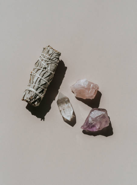 istock White sage and amethyst and quartz crystals on a light beige background 2154468155