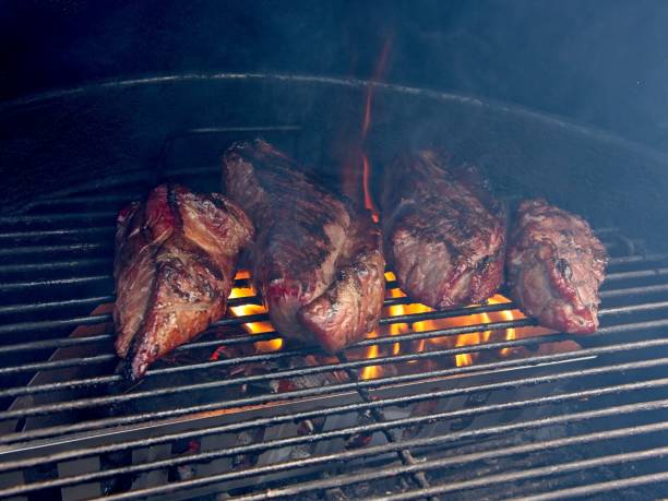 istock Sirloin cap steaks, also called picanha, cooked on the old-fashioned kettle charcoal grill 2154469209