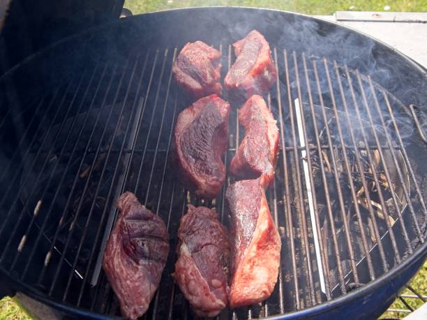 istock Sirloin cap steaks, also called picanha, cooked on the old-fashioned kettle charcoal grill 2154469220