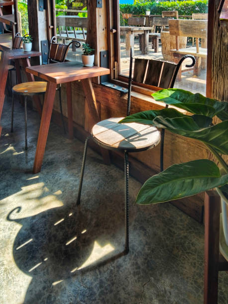 istock Relaxation corner with wooden surface tables and chairs, 2154469364