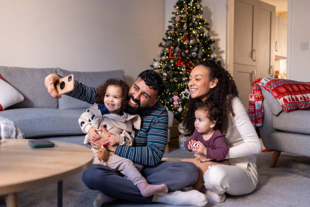 istock Joyful Family Capturing Christmas Selfie 2154469748