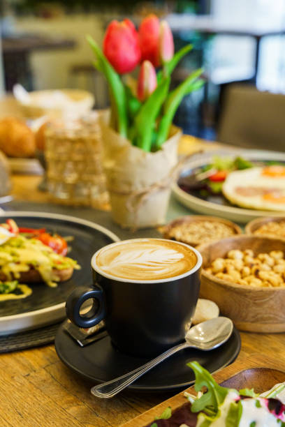 istock Cup of coffee on a brunch table 2154474208