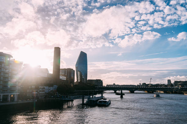 Sunset view on the Thames River in London, UK in Autumn near London Bridge and One Blackfriars Building