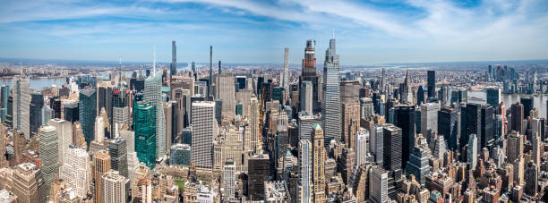 istock Panoramic view of Manhattan's skyscrapers in a sunny day from above 2154481976