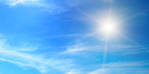 istock Bright sun on a cloudy sky. Wide photo. 2154483935
