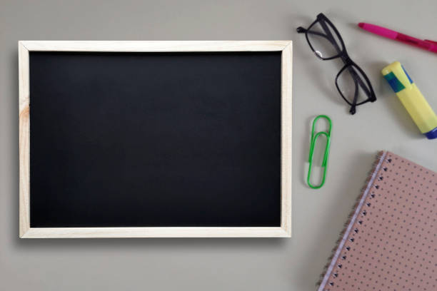 istock Template with place to insert text on black school board. 2154486127