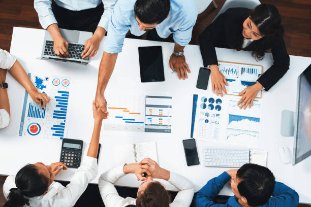 istock Group of diverse office worker employee shake hand and working together. Prudent 2154486252