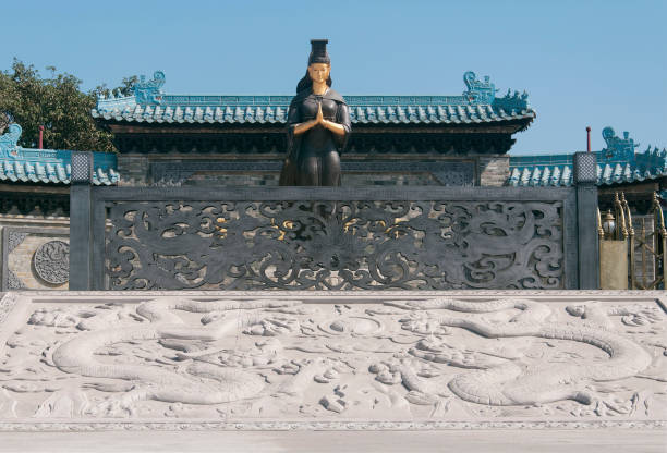 A large stone mural in front of the goddess of the sea, Tian Hou, at the Chiwan Tian hou temple in Nanshan area of Shenzhen China.