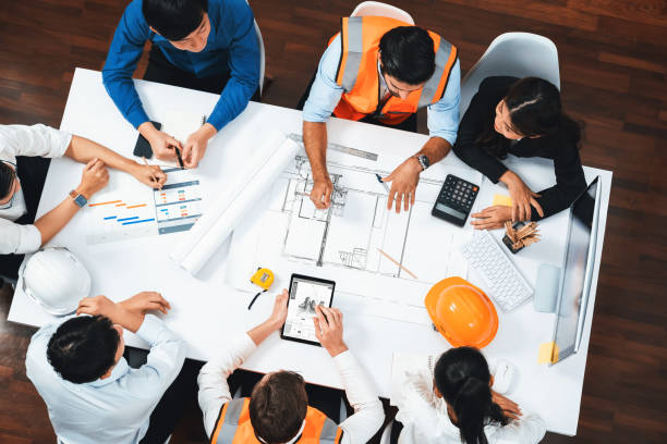 istock Diverse group of civil engineer and client working on architect. Prudent 2154490380