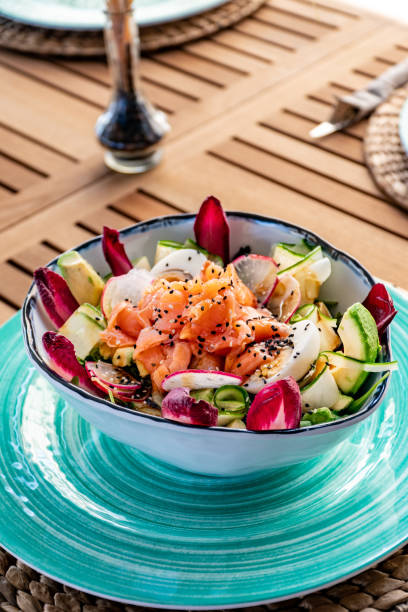 istock View over salmon and vegetable salad 2154490589