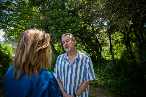 istock Cancer patient walking with caregiver 2154496833