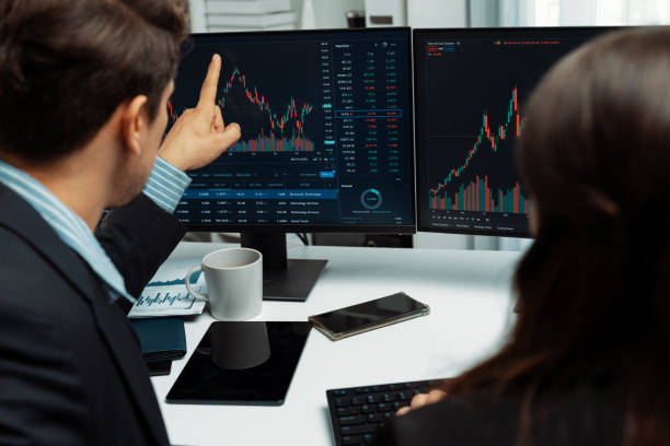 istock Business traders discussing on dynamic stock risk or profit point. Postulate. 2154498028