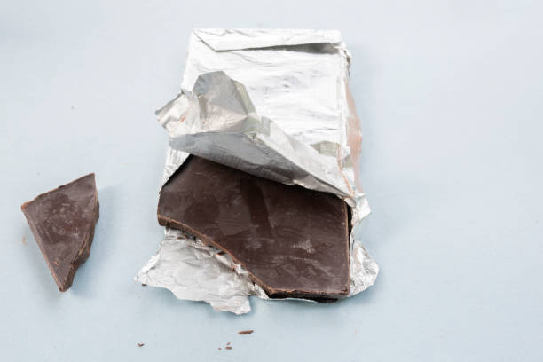 istock Unpacked chocolate bar in foil. 2154499465
