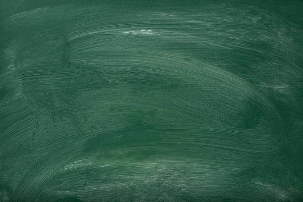 istock Empty school chalkboard background with chalk traces and space for copy 2154499912
