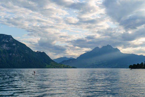 Scenic view of mountains with snowy peaks on lake lucerne.