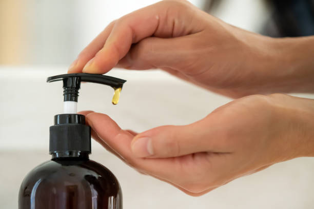 istock Girl washes her hands with soap. 2154514322