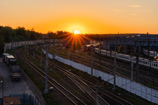 istock A red sunset over the railway tracks. Urbanism and infrastructure 2154517751