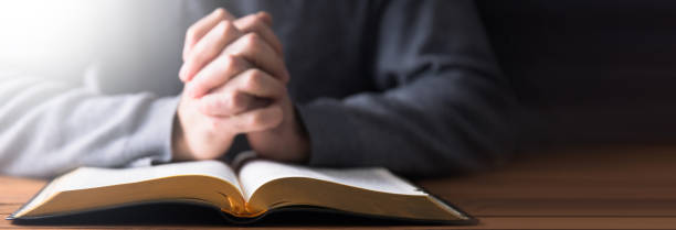 prayer man with Holy Bible