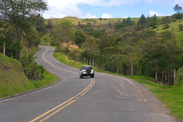istock Curvy road in a Colombian countryside. 2154520372