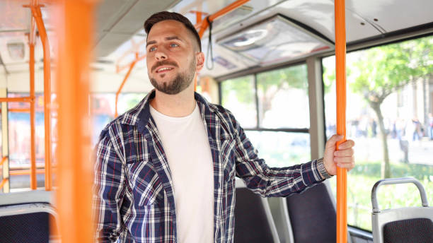 istock Young man riding in a bus 2154521338