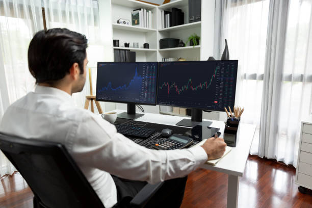 istock Trader analyzing in dynamic stock exchange investment screen on pc. Surmise. 2154523612