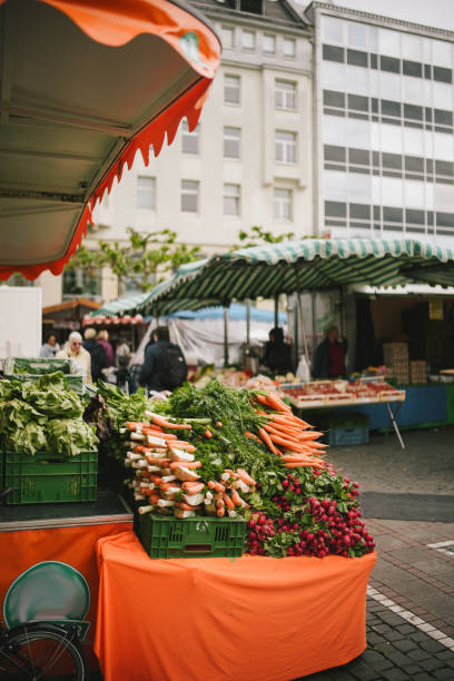istock Vegetable stall at outdoor market 2154523613