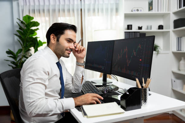 istock Trader analyzing in dynamic stock exchange investment screen on pc. Surmise. 2154524568