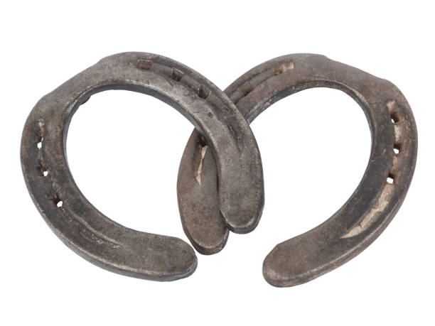 Two old horseshoe isolated on transparent background. Good luck and fortune charm.
