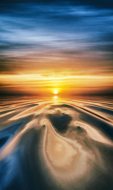 istock Stormy sky at dawn or dusk over ripples in water 2154525664