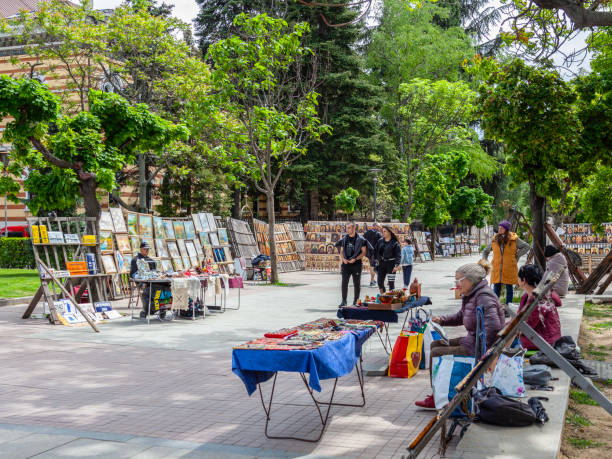 Koprivshtitsa, Bulgaria - 18 June, 2019: Historical center of the village of Koprivshtitsa with cobblestone streets and souvenir shop
