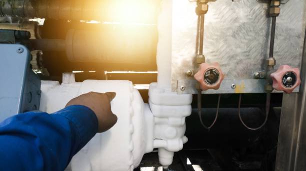 istock Chiller compressor appears frost due to problems in the refrigerant line. 2154526631
